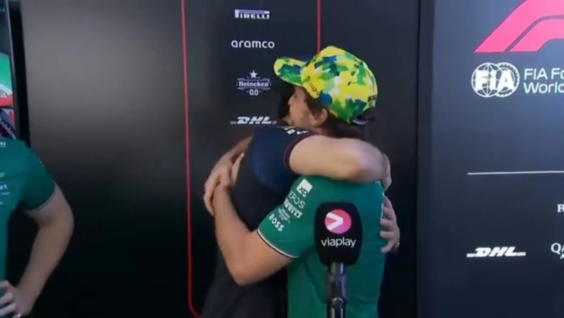 Friendly Rivals! Alonso and Perez Share a Hug, Teasing Each Other Good-Naturedly -illustration-