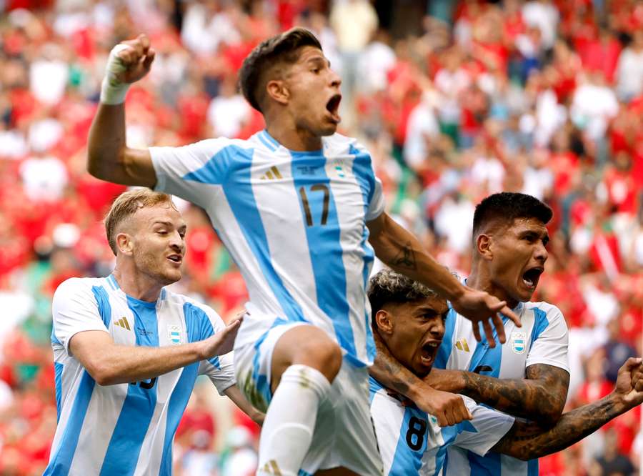 Cristian Medina of Argentina celebrates scoring their second goal with teammates