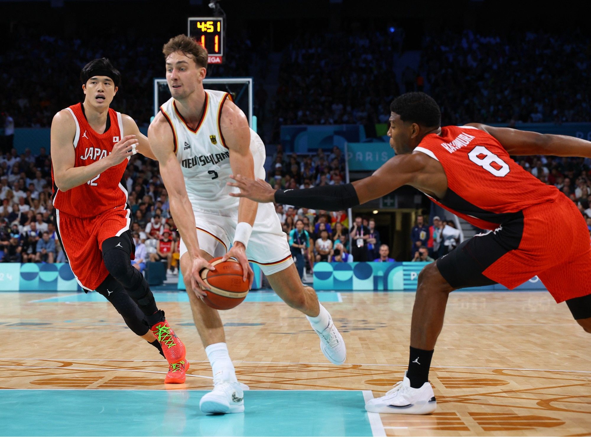 Men’s Olympic Basketball Match Report: Schröder and Wagner Jr. Lead, Hachimura Scores as Germany Secures First Group Stage Win -illustration-